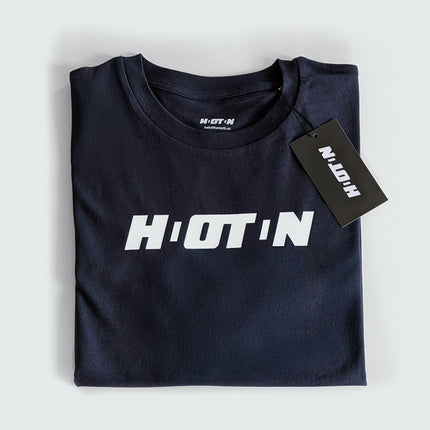 maglietta in cotone blu con logo HOTN ripiegata